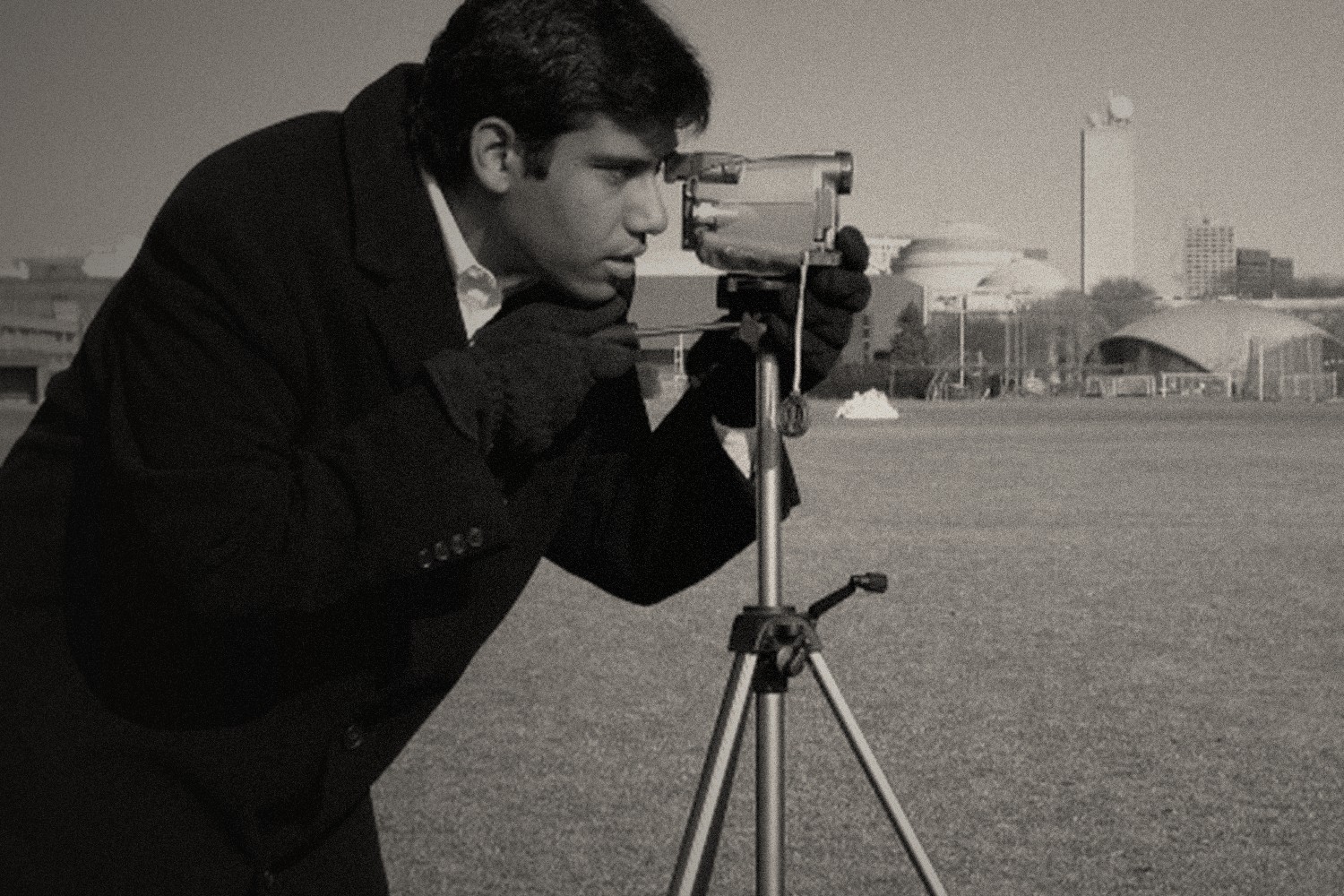 Documentary photographer working with a camera
